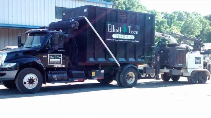 Elliott Tree branded truck and wood chipper